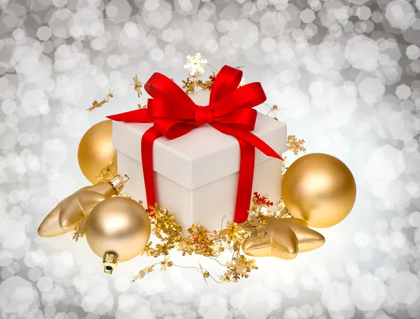 White gift box over dark blurred background — Stock Photo, Image
