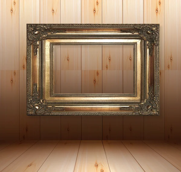 Wooden interior with golden frames — Stock Photo, Image