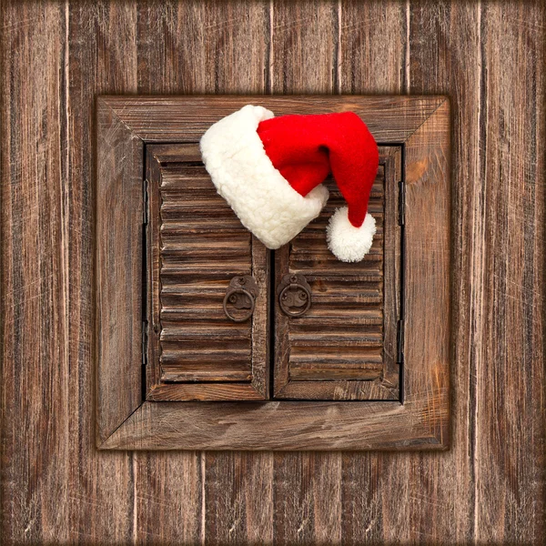 Cappello Babbo Natale su sfondo di legno — Foto Stock