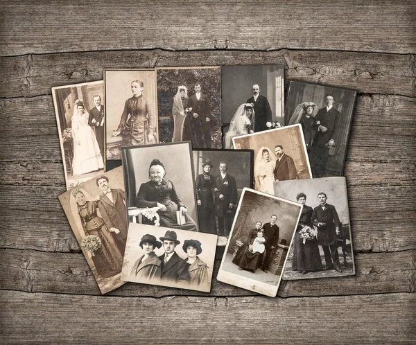 Vintage familj foton på trä bakgrund Stockbild