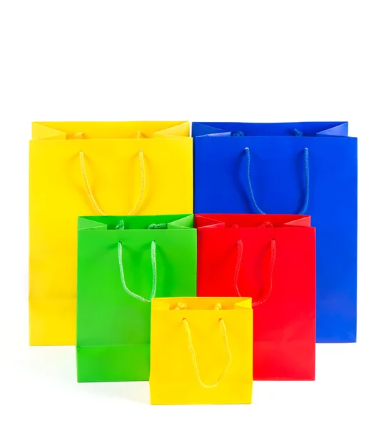 Shopping bag multicolore assortiti su bianco — Foto Stock