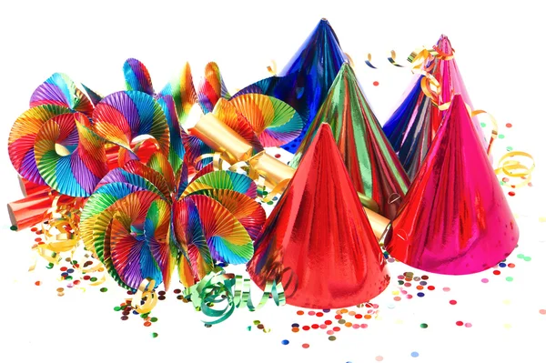 Guirnaldas coloridas, serpentinas, sombreros de fiesta y confeti — Foto de Stock