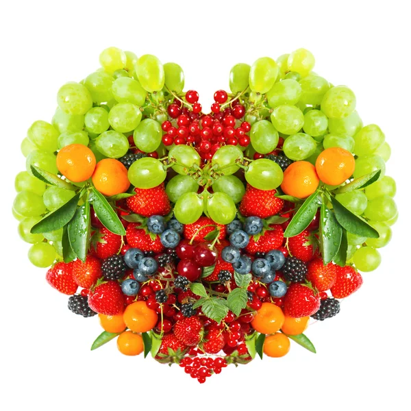 Heart shaped mix of fruits and berries on white — Stock Photo, Image