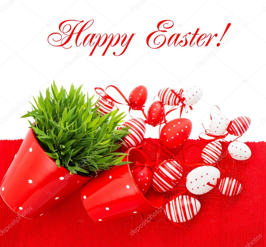 white red painted easter eggs with green grass
