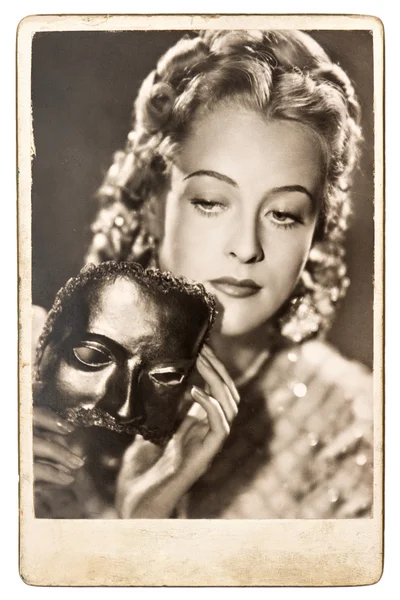 Portrait of young woman with a carnival mask — Stock Photo, Image