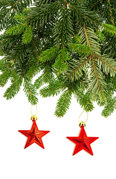Christmas decoration with red stars and fir tree branch — Stock Photo, Image