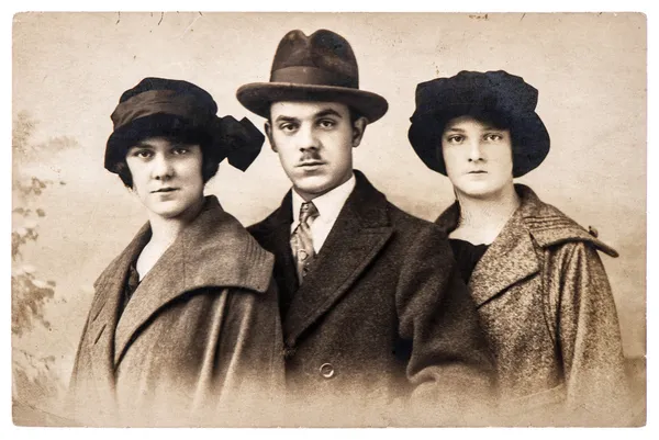 Antique portrait of young people wearing vintage clothing — Stock Photo, Image