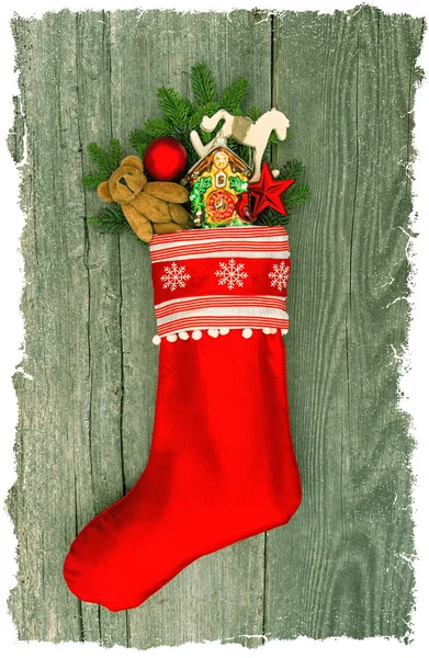 Рождественский чулок с украшением — стоковое фото