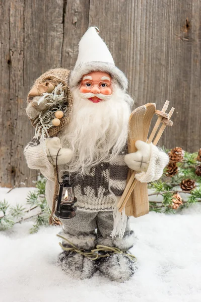 Santa Claus with christmas tree and gifts — Stock Photo, Image