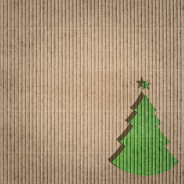 Recycling paper with green christmas tree — Stock Photo, Image