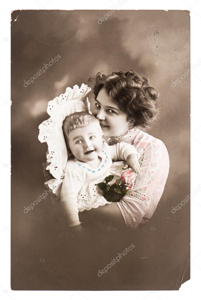 Antique portrait of lucky mother with her cute baby