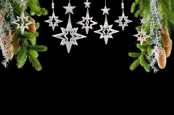 Christmas tree with shiny silver stars — Stock Photo, Image