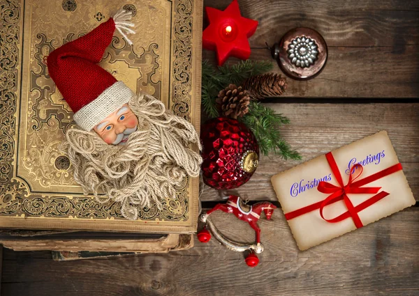 Decoração de Natal vintage com cartão de felicitações — Fotografia de Stock