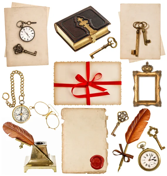 Antique clock, key, photo album, feather pen, inkwell, compass — Stock Photo, Image