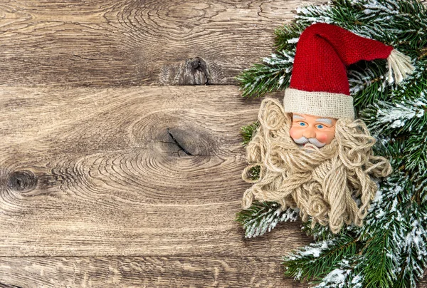 Santa Claus christmas decoration with pine tree branch — Stock Photo, Image