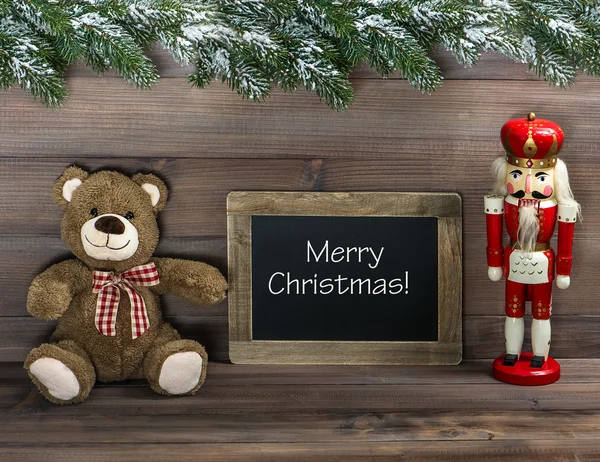 Christmas decoration with antique toys and blackboard — Stock Photo, Image