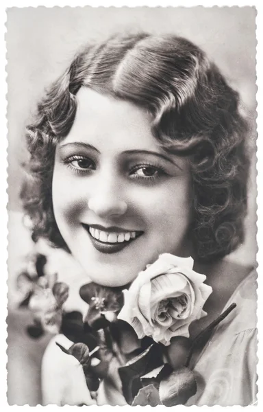 Young woman with rose flowers, ca. 1920 Paris — Stock Photo, Image