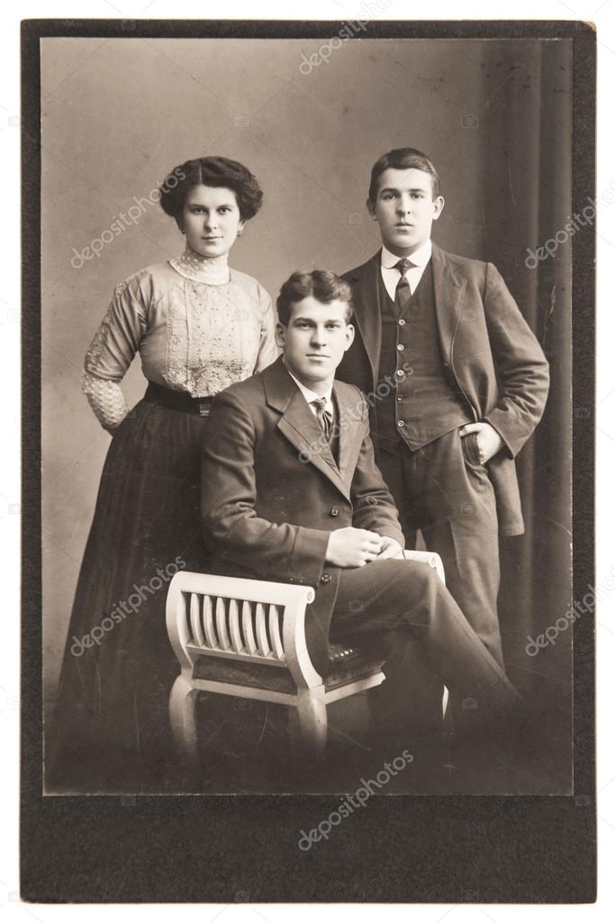 Antique portrait of young people wearing vintage clothing