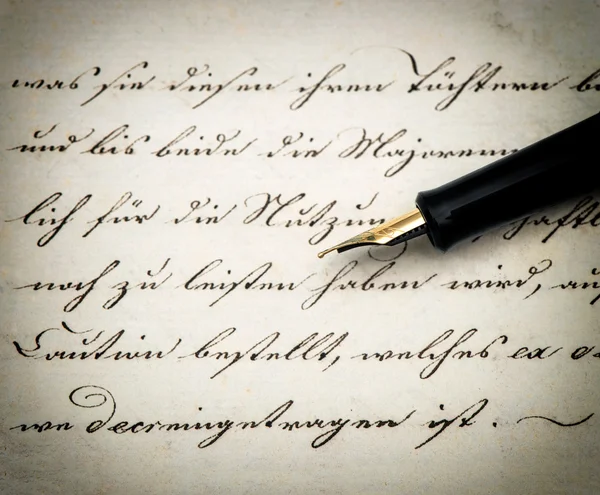 Calligraphic handwritten text and vintage ink pen — Stock Photo, Image