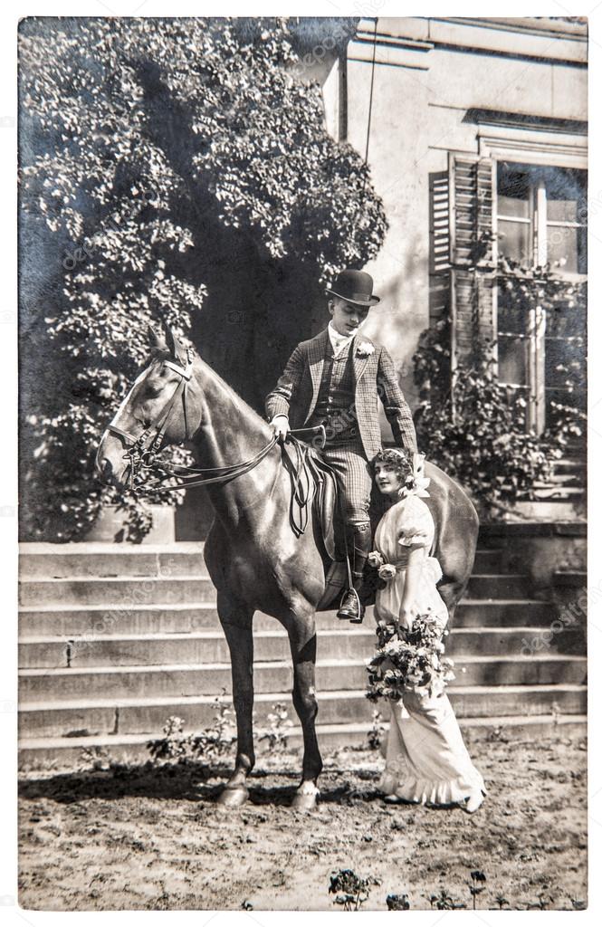 Antique photo. portrait young couple wearing vintage clothing