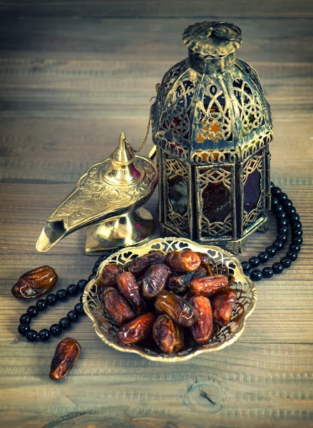 Dates, oriental lamp, lantern and rosary. arabic holidays concep — Stock Photo, Image