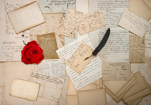 Old letters, handwritings, vintage postcards and red rose — Stock Photo, Image