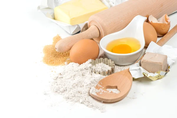 Baking ingredients eggs, flour, yeast, sugar, butter — Stock Photo, Image