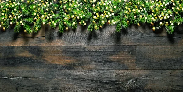 Рождественский Фон Золотыми Огнями Ветвями Сосен — стоковое фото
