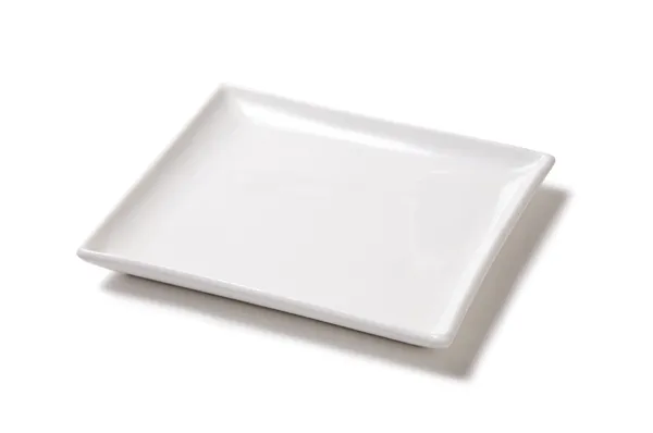 White empty plate of earthenware Royalty Free Stock Images