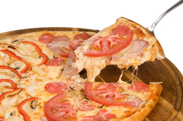 Pizza with salami ham pepper and tomato on wooden plate — Stock Photo, Image