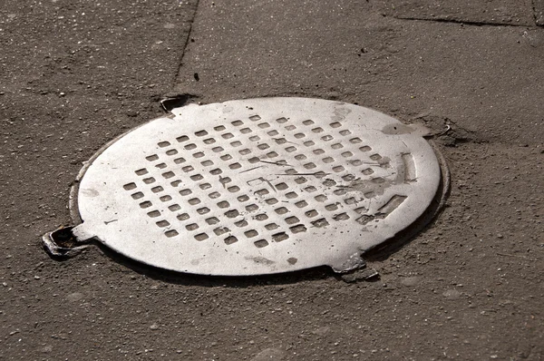 Ciudad tapa de boca de inspección — Foto de Stock