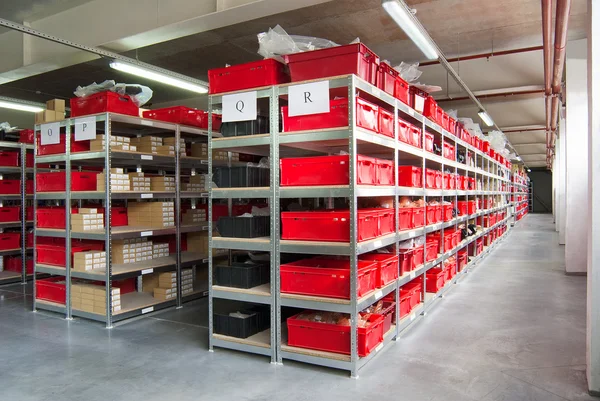 Storage room with boxes and shelves — Stock Photo, Image