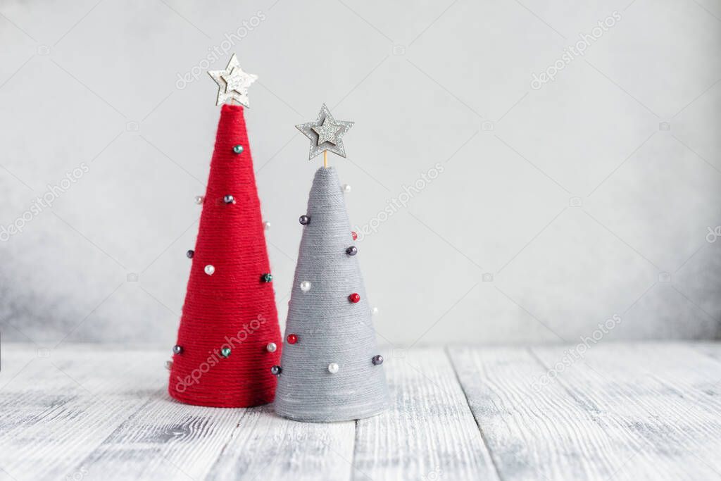 Christmas composition with handmade xmas trees. Copy space for your text