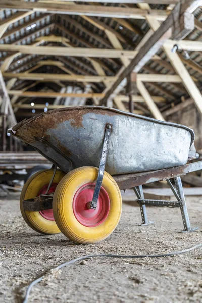 Wheelbarrow Yellow Tires Old Abandoned Warehouse Close — ストック写真
