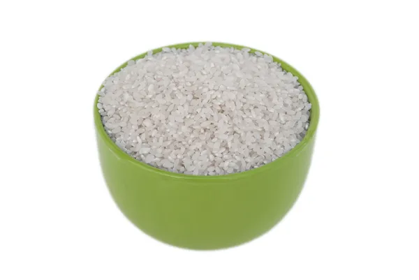 Bowl of uncooked rice — Stock Photo, Image