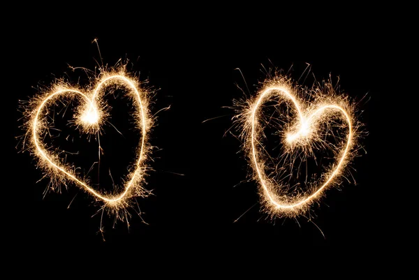 Two hearts drawn sparkler — Stock Photo, Image