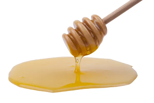 Med z dřevěnou lžící. — Stock fotografie