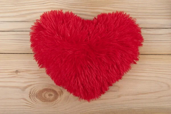 Fluffy heart on wooden background. — Stock Photo, Image