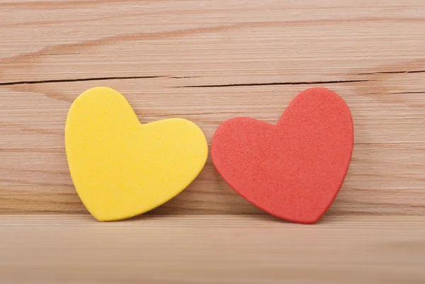 Two hearts on a wooden background. — Stock Photo, Image