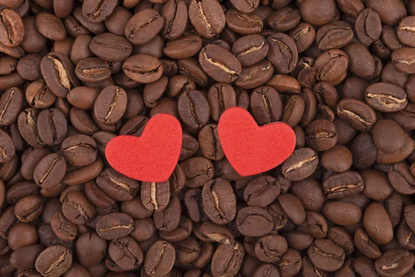 Two hearts on coffee beans. — Stock Photo, Image