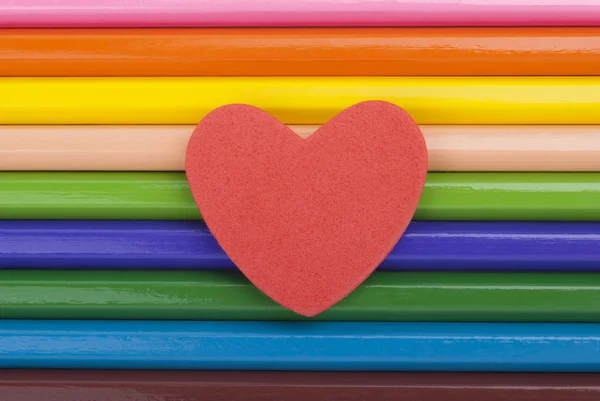 Heart on colored pencils. — Stock Photo, Image