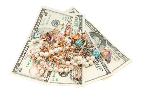 Gold jewelry and dollars — Stock Photo, Image