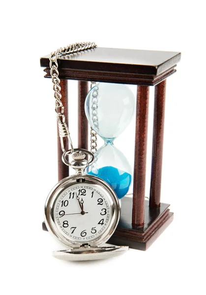 Hourglass and a pocket watch — Stock Photo, Image