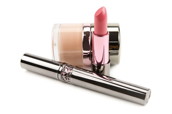 Lipstick mascara and cream powder on a white background — Stock Photo, Image