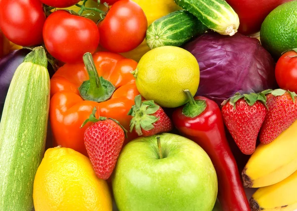 Bright background of different fruits and vegetables — Stock Photo, Image