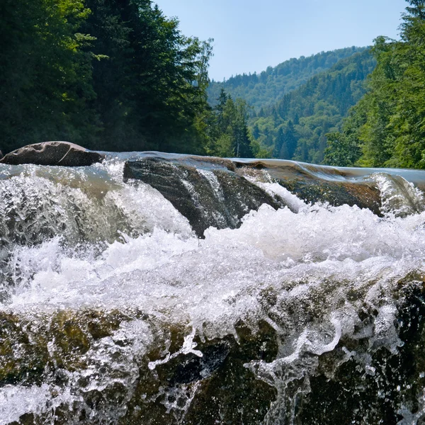 Waterfall on the river in the mountains — Stock Photo, Image