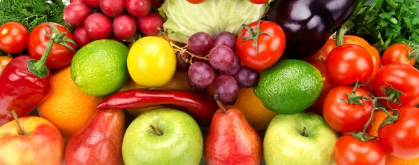 Bright background of ripe fruit and vegetables — Stock Photo, Image