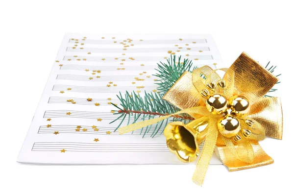 Christmas decorations and music sheet — Stock Photo, Image