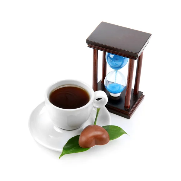 Klepsydra i filiżankę kawy — Zdjęcie stockowe