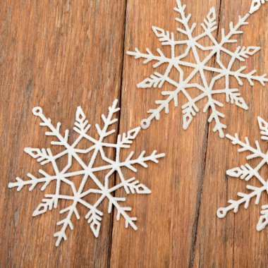 Kar taneli Noel çerçevesi. Parıldayan toz ışıl ışıl arkaplan